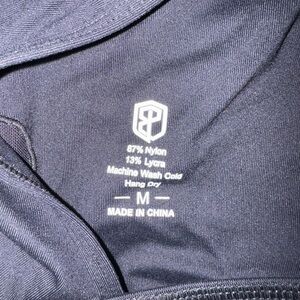 Black born primitive sports bra